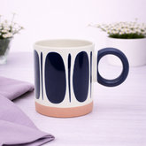White Ceramic Mug with Black Oval Pattern