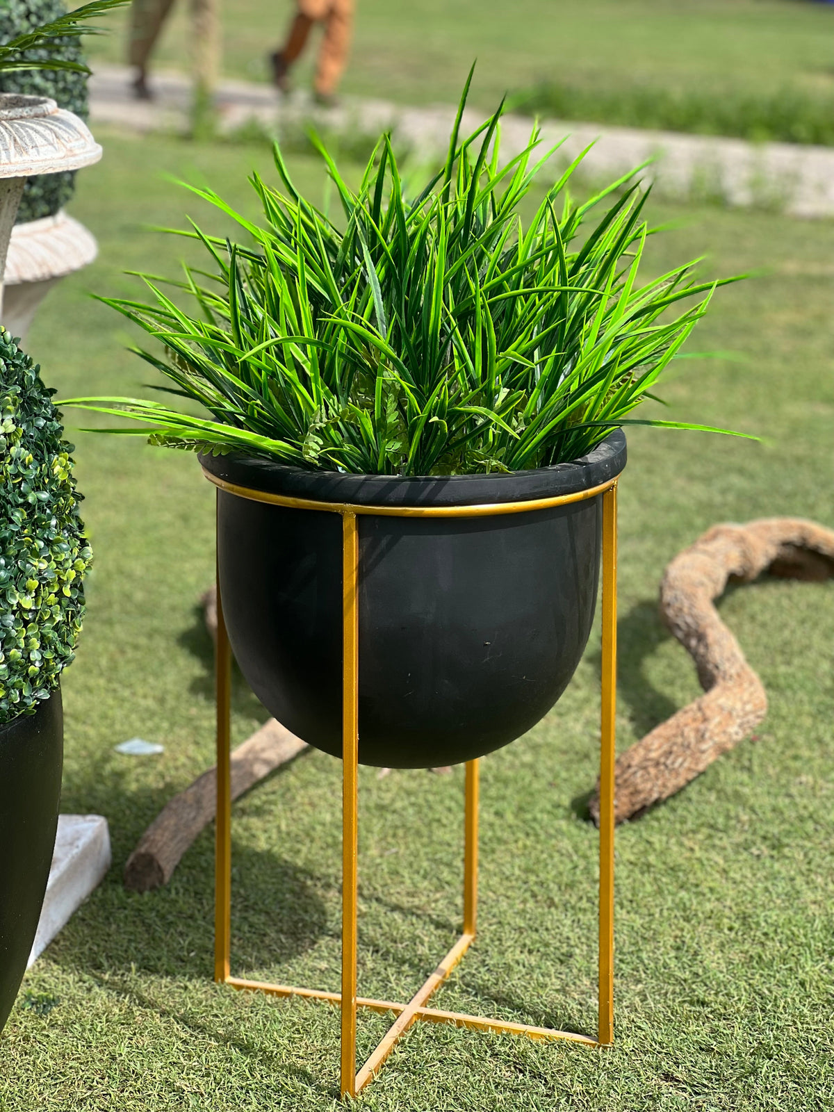 Modern metal stand with plant